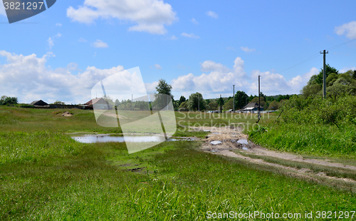 Image of Rural summer landscape with the image of the old village