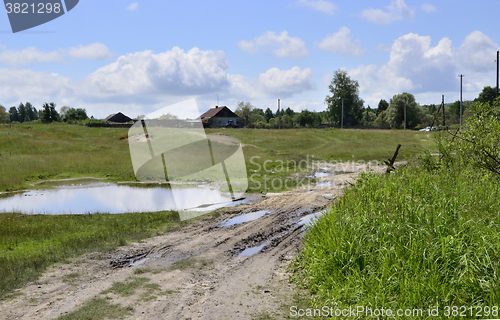 Image of Rural summer landscape with the image of the old village