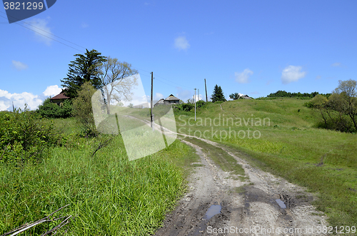 Image of Rural summer landscape with the image of the old village