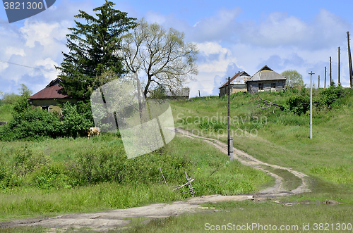 Image of Rural summer landscape with the image of the old village