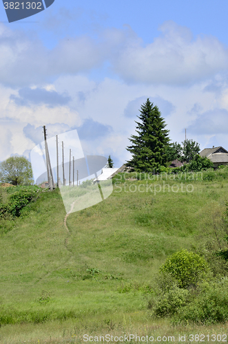 Image of Rural summer landscape with the image of the old village
