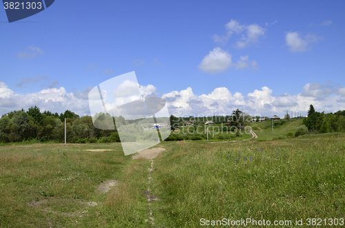 Image of Rural summer landscape with the image of the old village