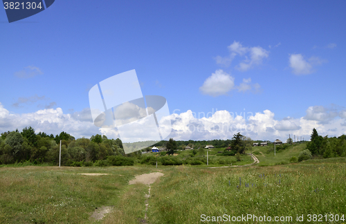 Image of Rural summer landscape with the image of the old village