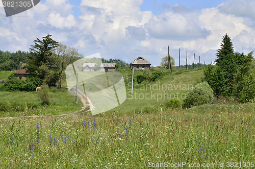 Image of Rural summer landscape with the image of the old village