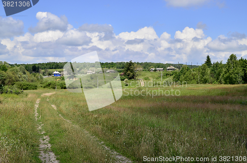 Image of Rural summer landscape with the image of the old village