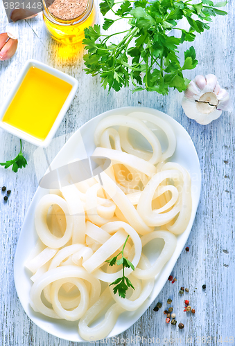 Image of Raw squid rings with pepper