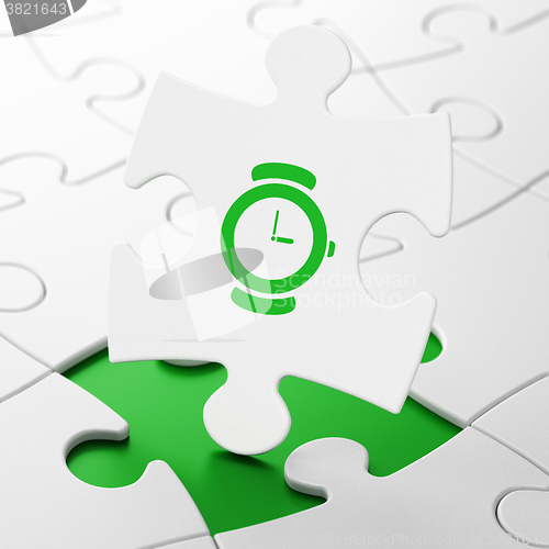 Image of Time concept: Hand Watch on puzzle background