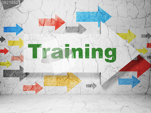 Image of Studying concept: arrow with Training on grunge wall background