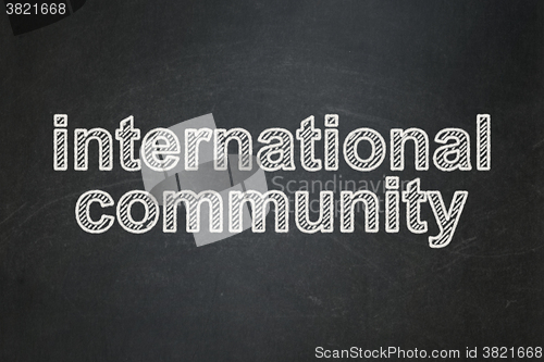 Image of Politics concept: International Community on chalkboard background