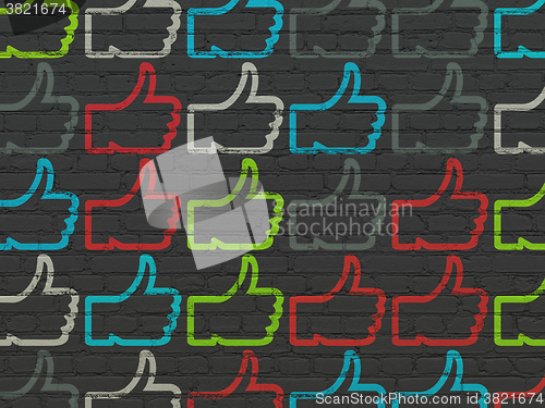 Image of Social media concept: Thumb Up icons on wall background