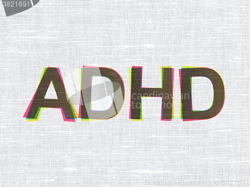 Image of Healthcare concept: ADHD on fabric texture background