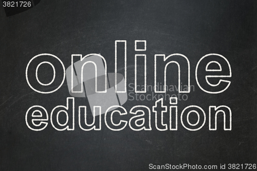 Image of Education concept: Online Education on chalkboard background