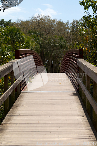 Image of red curved bridge