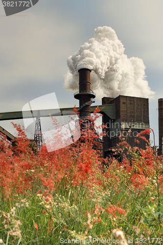 Image of Steel Mill Smelter emitting toxic fumes from chimney