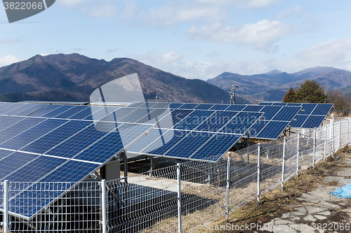 Image of Solar panel power plant in countryside