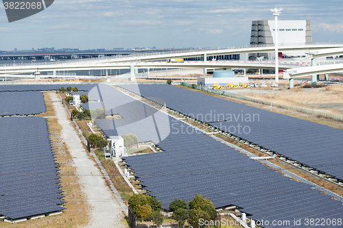 Image of Solar panels in industrial city