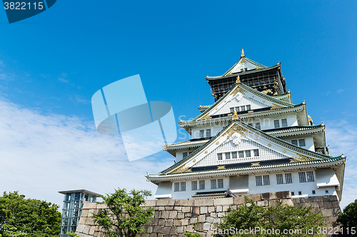 Image of Osaka castle in Japan with clear blue sky