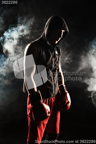 Image of The young  man kickboxing 
