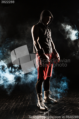 Image of The young  man kickboxing 
