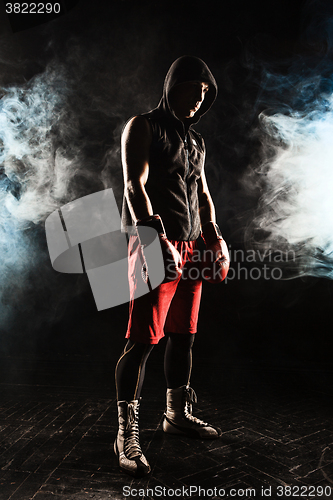 Image of The young  man kickboxing 