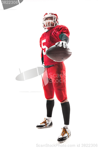 Image of American football player posing with ball on white background