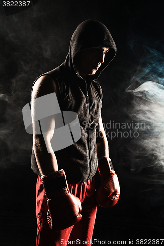 Image of The young  man kickboxing 