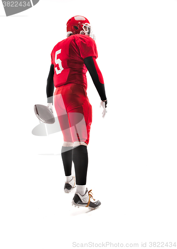 Image of American football player posing with ball on white background