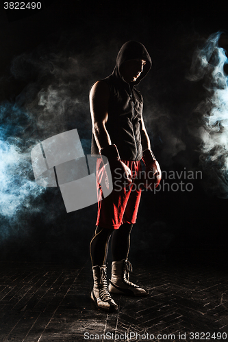 Image of The young  man kickboxing 