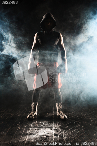 Image of The young  man kickboxing 