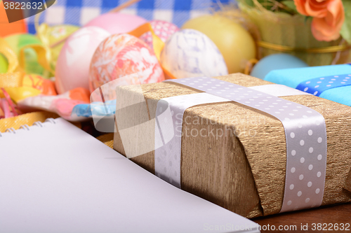 Image of Easter background with eggs, ribbons and spring decoration