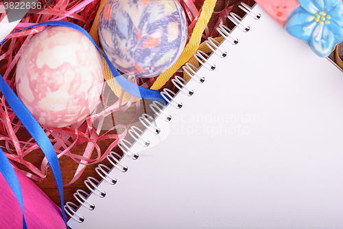 Image of Easter background with eggs, ribbons and spring decoration