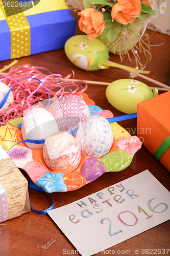 Image of holiday gift box with painted easter eggs