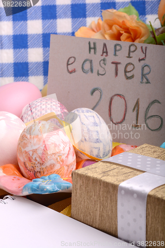 Image of Easter background with eggs, ribbons and spring decoration