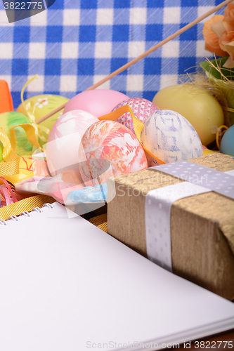 Image of Easter background with eggs, ribbons and spring decoration