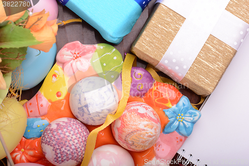 Image of Easter background with eggs, ribbons and spring decoration