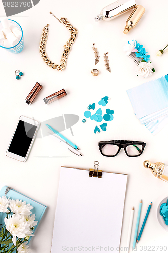 Image of Still life of fashion woman,  blue objects on white