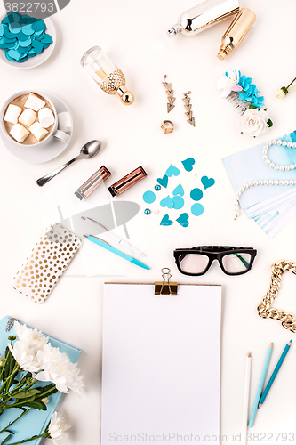 Image of Still life of fashion woman,  blue objects on white