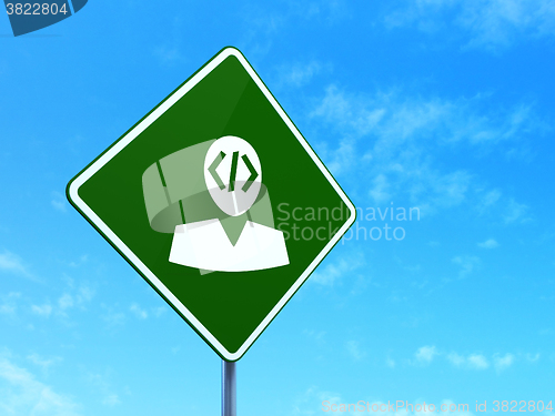 Image of Programming concept: Programmer on road sign background