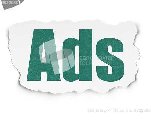 Image of Advertising concept: Ads on Torn Paper background