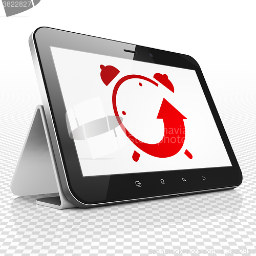 Image of Time concept: Tablet Computer with Alarm Clock on display