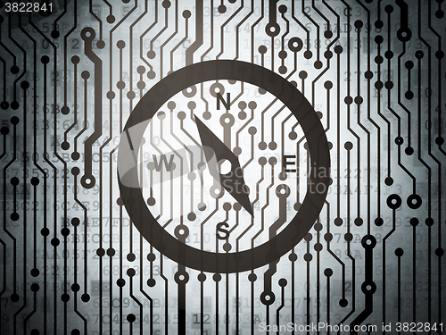 Image of Tourism concept: circuit board with Compass