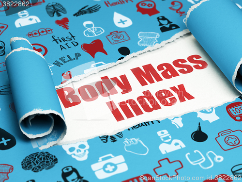 Image of Healthcare concept: red text Body Mass Index under the piece of  torn paper