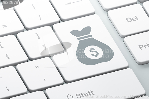 Image of Finance concept: Money Bag on computer keyboard background