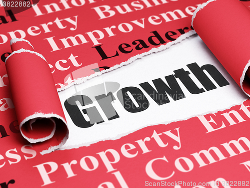 Image of Business concept: black text Growth under the piece of  torn paper