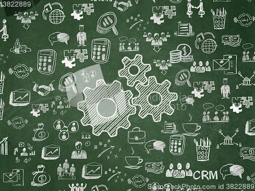 Image of Business concept: Gears on School Board background