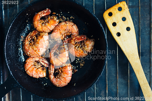 Image of Shrimp fried with garlic and sesame seeds