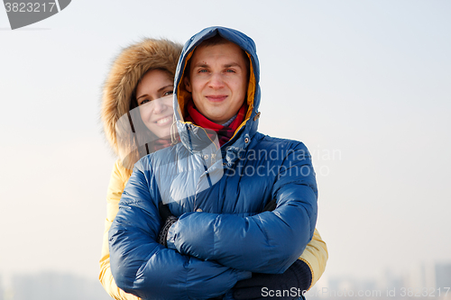 Image of Young couple together at outdoor in winter