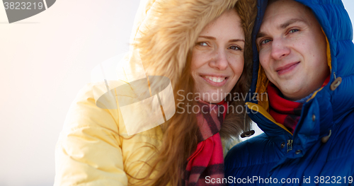 Image of Young couple together at outdoor in winter