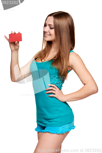 Image of Teen bright girl holding credit card