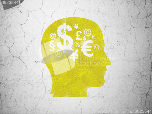 Image of Learning concept: Head With Finance Symbol on wall background